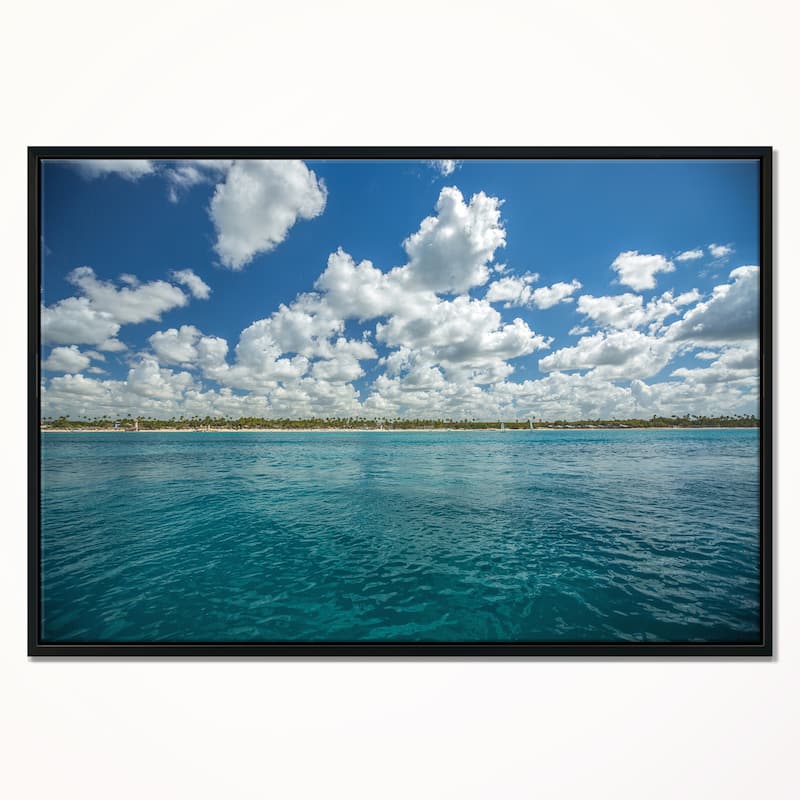 Designart "White Fluffy Clouds Over Sea" Oversized Beach Framed Canvas Artwork Print