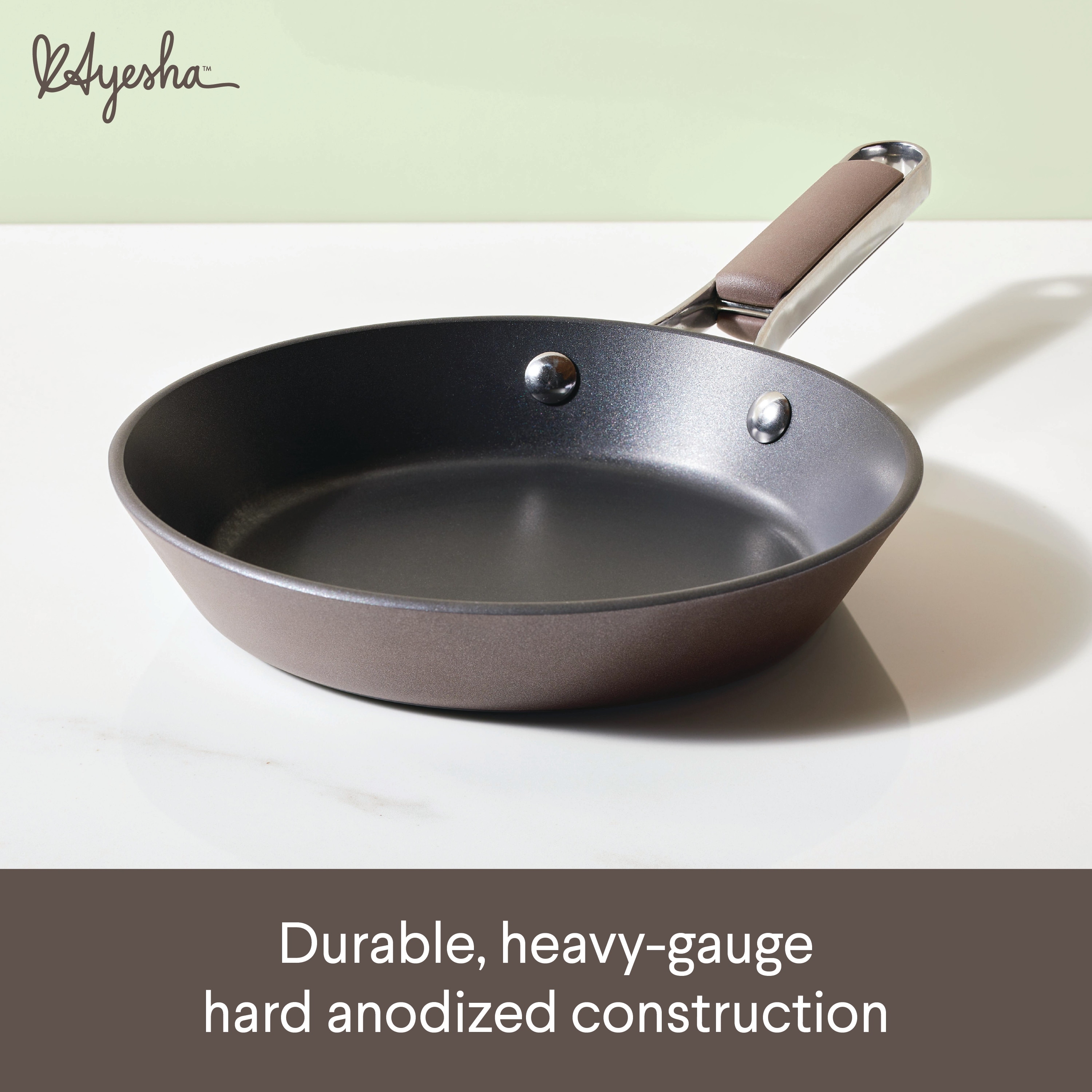 https://ak1.ostkcdn.com/images/products/is/images/direct/bbfd2077f53da67ebc7a66f1c4f59b8a7fedabad/Ayesha-Curry-Hard-Anodized-Collection-Nonstick-Frying-Pan%2C-8.25-Inch%2C-Charcoal.jpg
