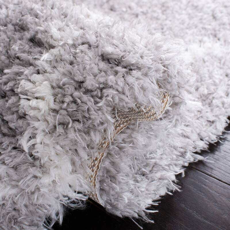 SAFAVIEH Handmade Flokati Agni Shag Solid Polyester Rug