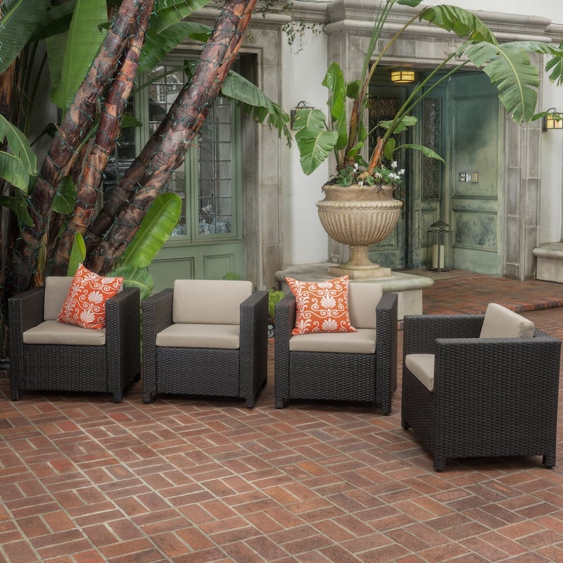 Roomfitters 4-Piece Wicker Patio Conversation Set with Cushions and Coffee Table