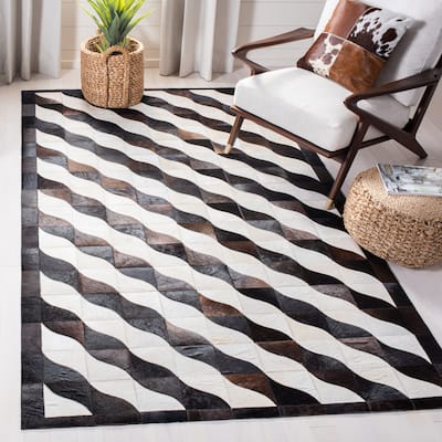 SAFAVIEH Handmade Studio Leather Danyel Modern Rug