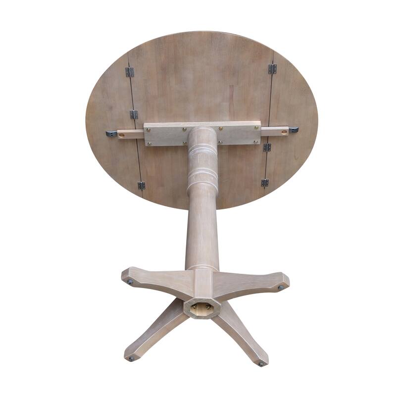 42 in. Round Top Dual Drop Leaf Pedestal Dining Table