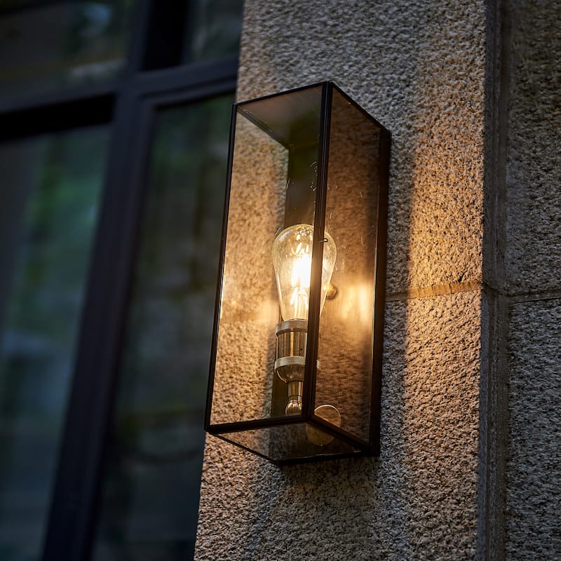 1 Light outdoor wall sconce with clear glass, Black exterior , gold interior Finish - 14.25"H x 4.75"W x 5"D