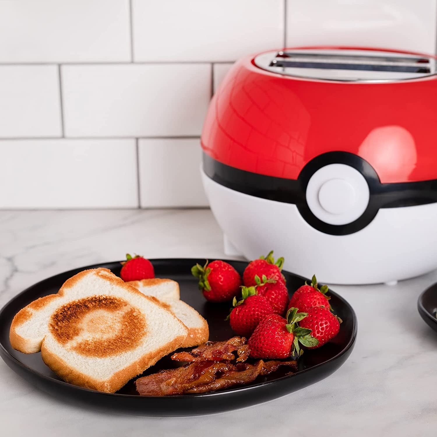 https://ak1.ostkcdn.com/images/products/is/images/direct/bcef204fb4c654124ba6a51f90ec6854d5f4b92a/Pokemon-Pokeball-Halo-Toaster-%5Cu2013-Toasts-a-Pokeball-On-Your-Bread.jpg