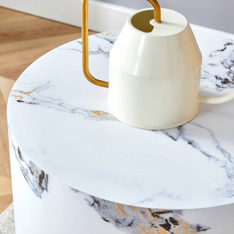 The cylindrical table with its patterned design can be easily integrated into a variety of interior styles, small dining tables