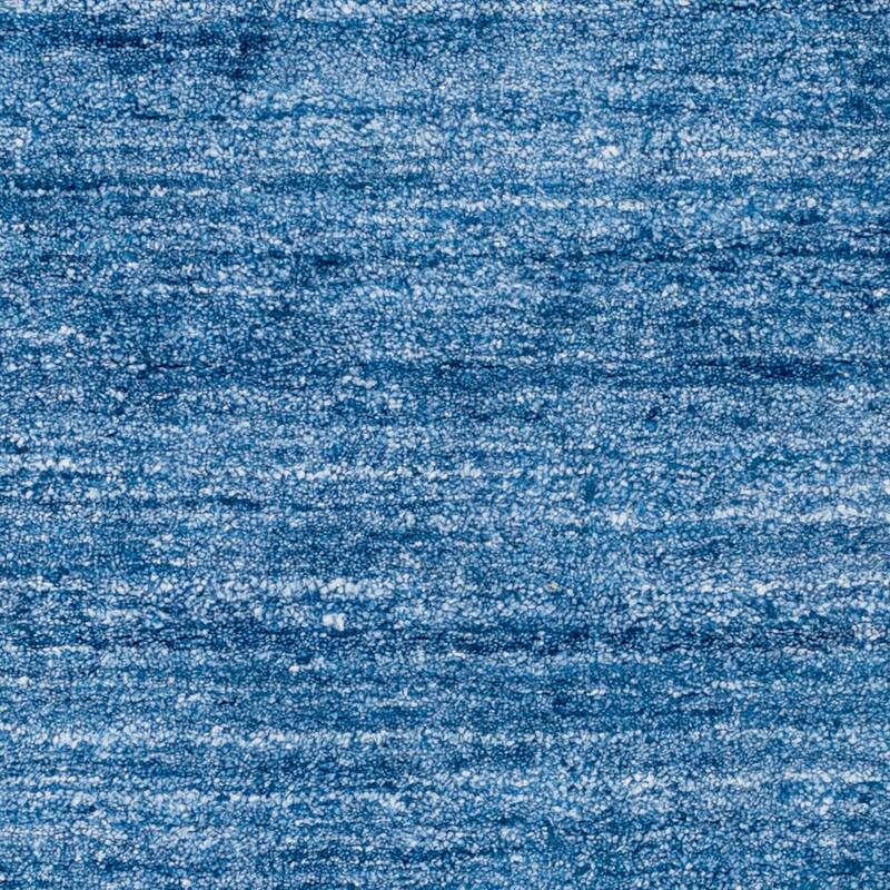 Hand-woven Dan Solid Viscose Area Rug