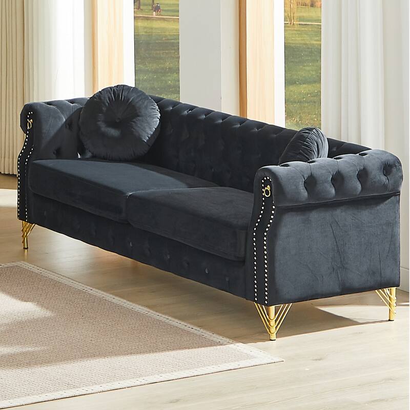 Chesterfield Sofa with Two Round Pillows, Featuring Copper Stud Detailing and Tufted Button Accents