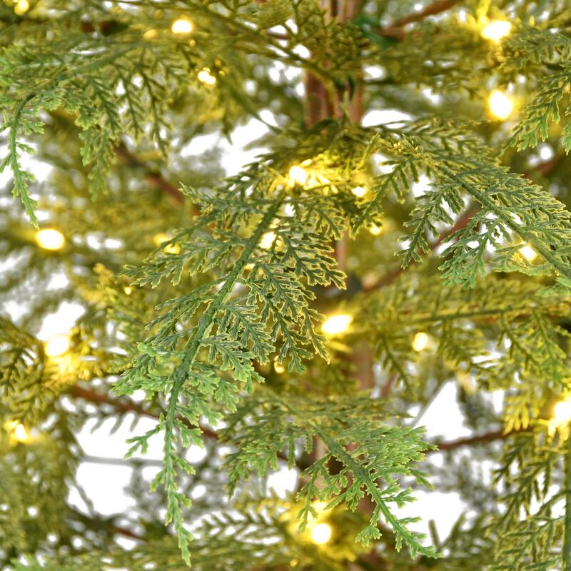 Puleo International 9' Pre-Lit Artificia Cypress Christmas PE Tree with LED Rice Lights