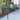 Alpine Corporation Metal Garden Bench with Retractable Table