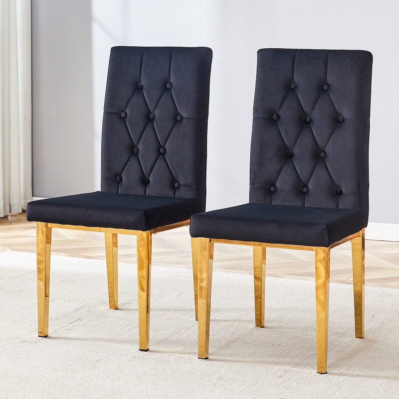 2 piece dining chairs.The gold metal legs complement the black velvet, showcasing a perfect blend of modern and classic elements