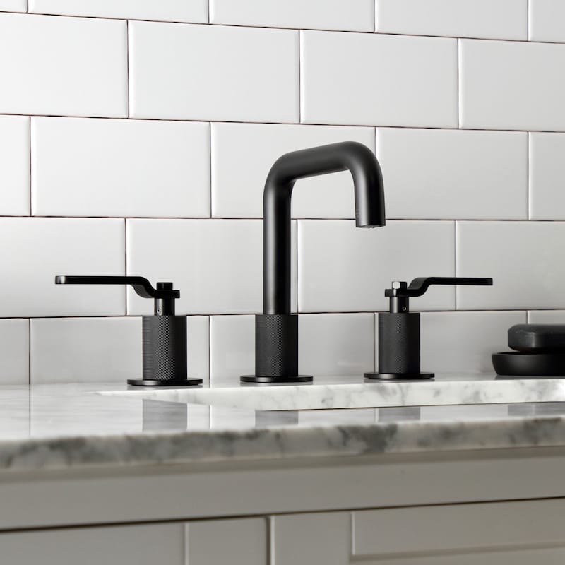 Kingston Brass Whitaker Two-Handle 3-Hole Deck Mount Widespread Bathroom Faucet with Push Pop-Up
