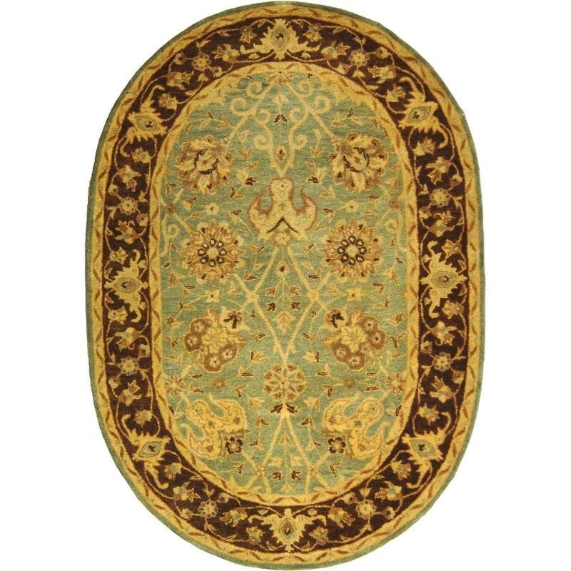 SAFAVIEH Handmade Antiquity Mazie Traditional Oriental Wool Rug - 4'6" x 6'6" Oval - Green/Brown