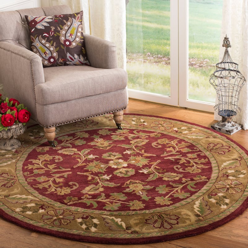 SAFAVIEH Handmade Heritage Gullu Traditional Oriental Wool Rug - 6' Round - Red/Gold