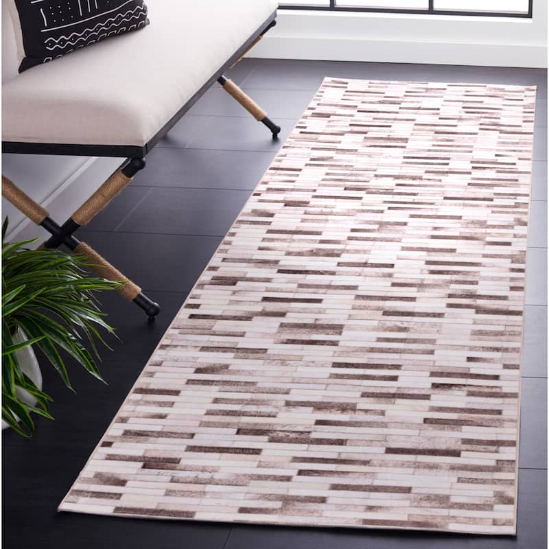 SAFAVIEH Faux Hide Machine Washable Slip Resistant Nieve Modern