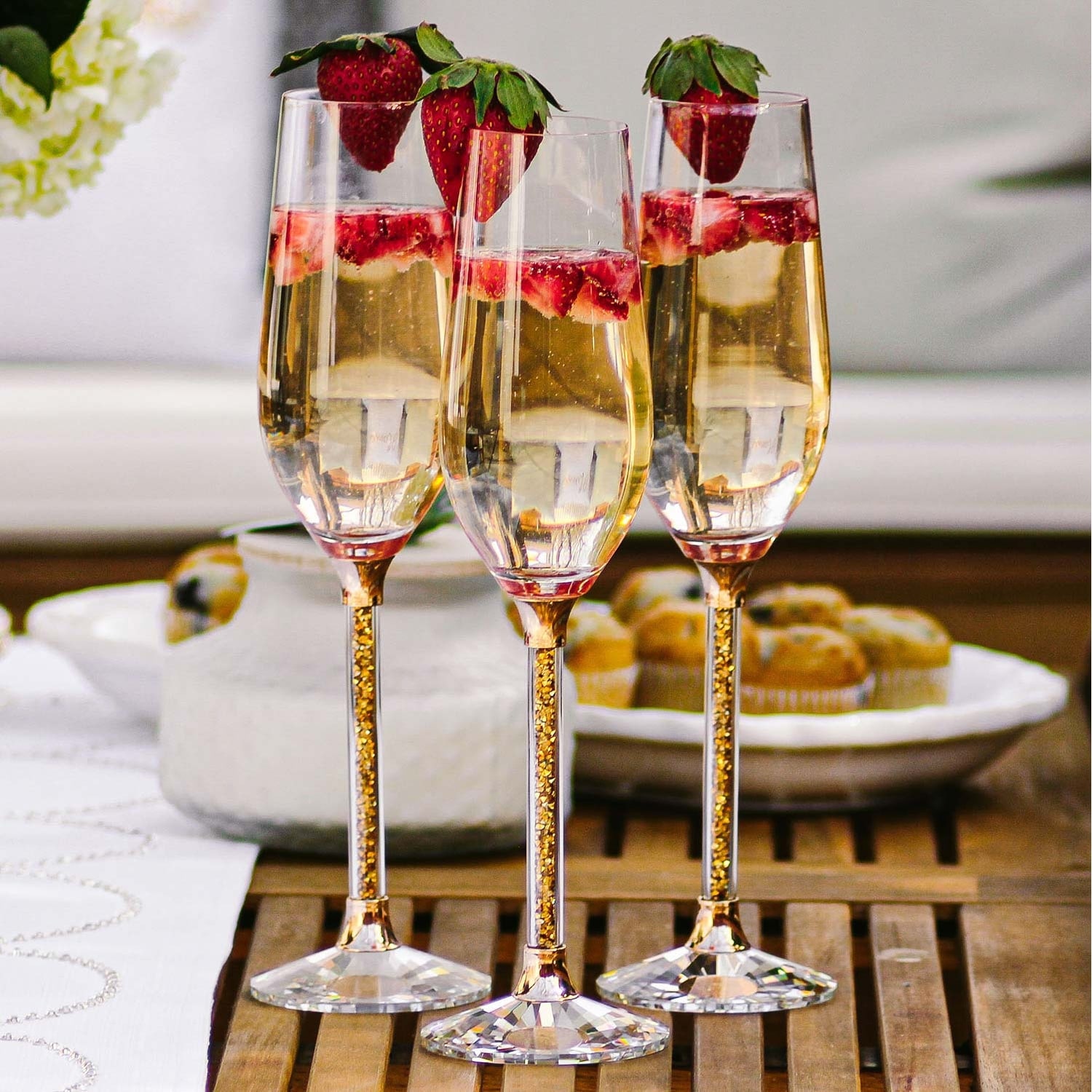 https://ak1.ostkcdn.com/images/products/is/images/direct/bdd5fb01cd73cffe05aae6c50a6bef5dbd1b08c1/Sparkles-Home-Rhinestone-Crystal-Filled-Stem-Toasting-Flutes.jpg