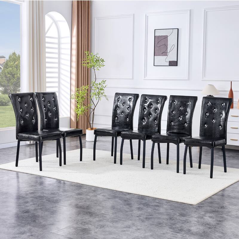 A set of 2 vintage crocodile leather cushioned dining chairs, featuring crystal clasp design and artificial leather design
