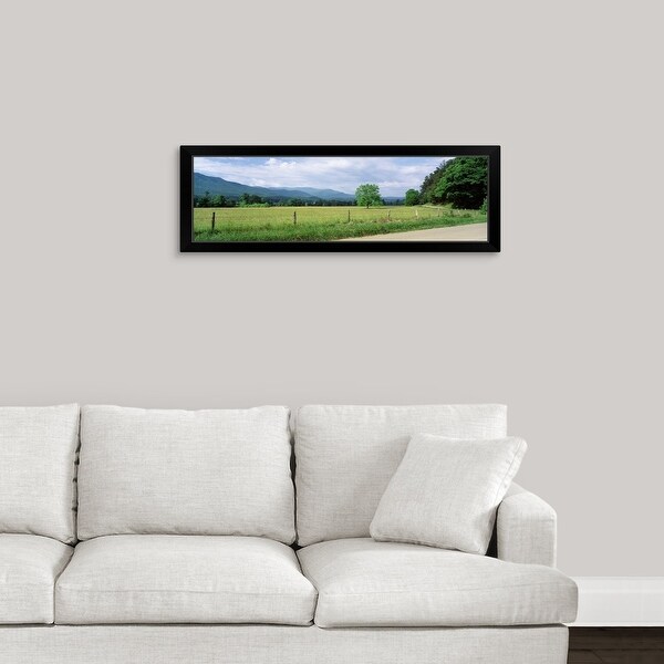 "Tennessee, Great Smoky Mountains National Park, Cades Cove, Road along a grass field" Black Framed Print