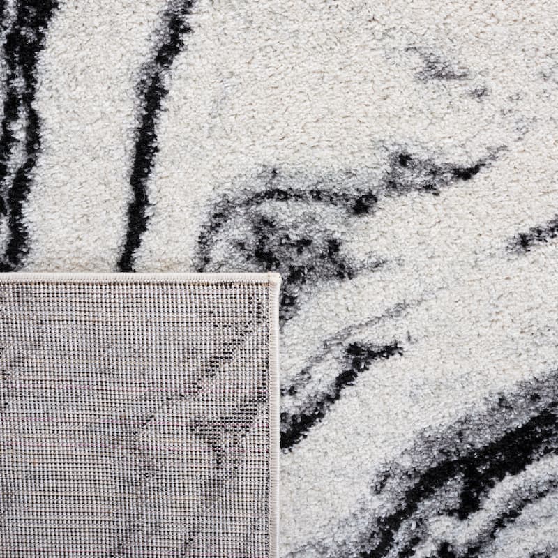 SAFAVIEH Tucson Odessa Machine Washable Traditional Rug
