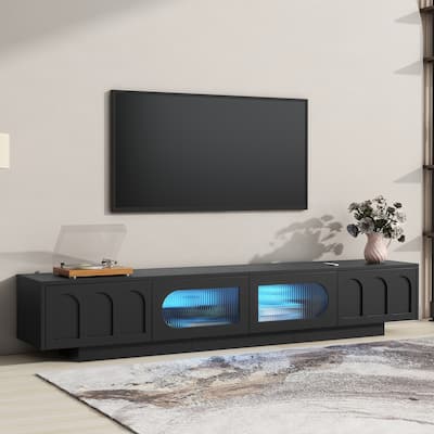 TV Stand with Fluted Glass Doors for TVs Up to 95'', Media Console with Arched Cabinet Doors, LED Light, White.