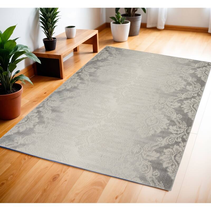 Doziq Power Loomed Distressed Non Skid Stain Resistant Low Pile Area Rug By HomeRoots - 72' X '48' X '0.25 - 72' X '48' X '0.25 - Lavender/Ivory - Rectangle