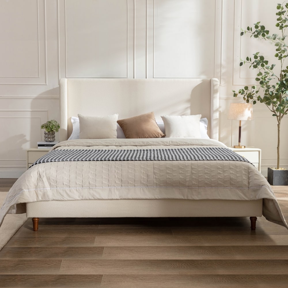 Contemporary Upholstered Platform Bed with Wingback Headboard.