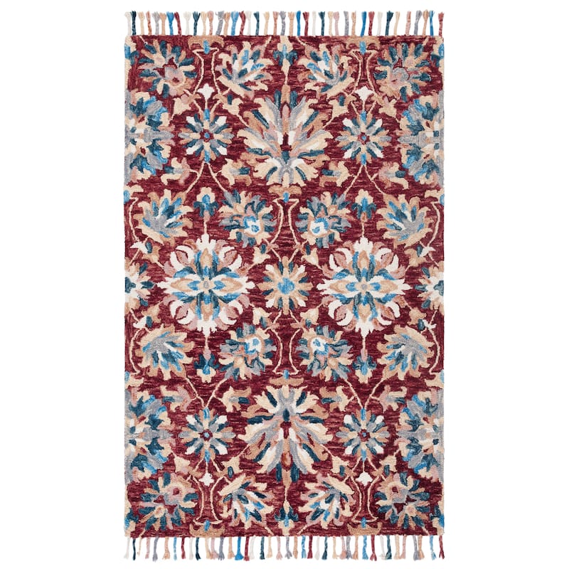 SAFAVIEH Handmade Aspen Orane Floral Braided Tassel Wool Rug