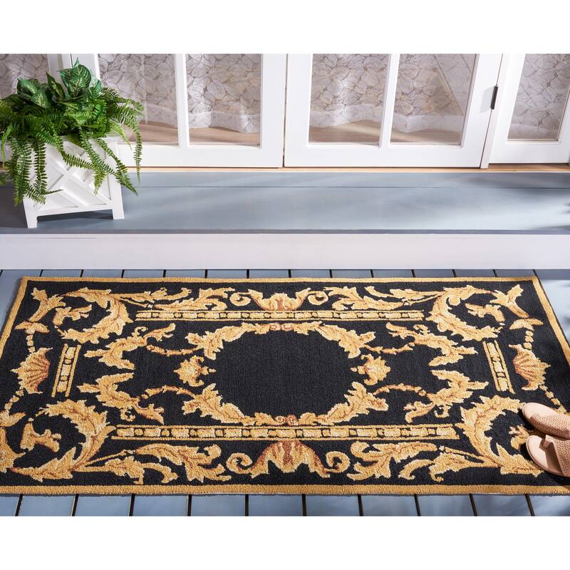 SAFAVIEH Handmade Monogram Mafumi Casual Rug