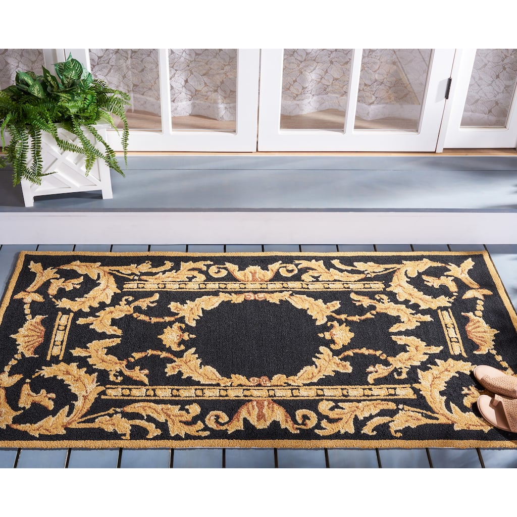 SAFAVIEH Handmade Monogram Mafumi Casual Rug