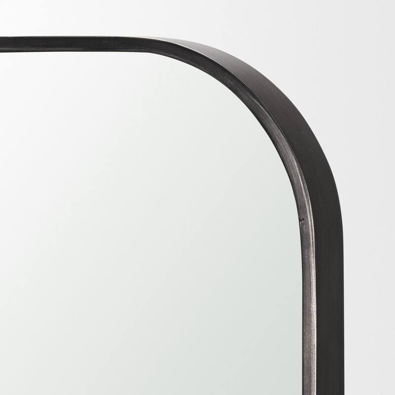 Timon is a square mirror with an arched brushed black metal frame. - 36.0L x 1.8W x 34.3H