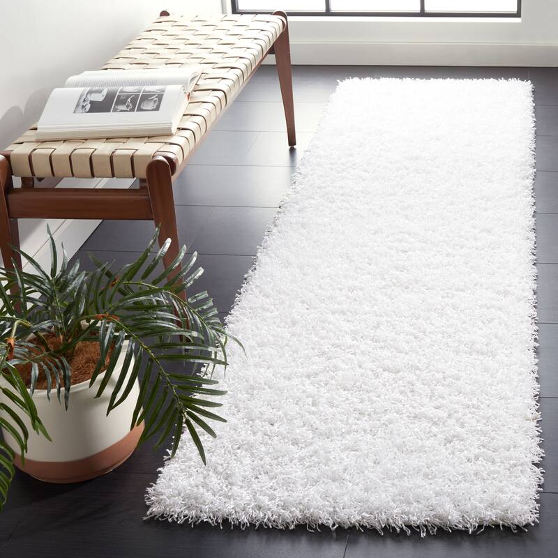 SAFAVIEH Handmade Rubi Shag Mevlide Solid Polyester Rug - 2'3" x 8' Runner - White