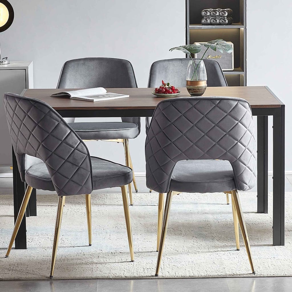 Stylish Velvet Dining Chairs with Metal Legs and Hollow Back, Set of 4 for a Modern and Inviting Dining Experience.