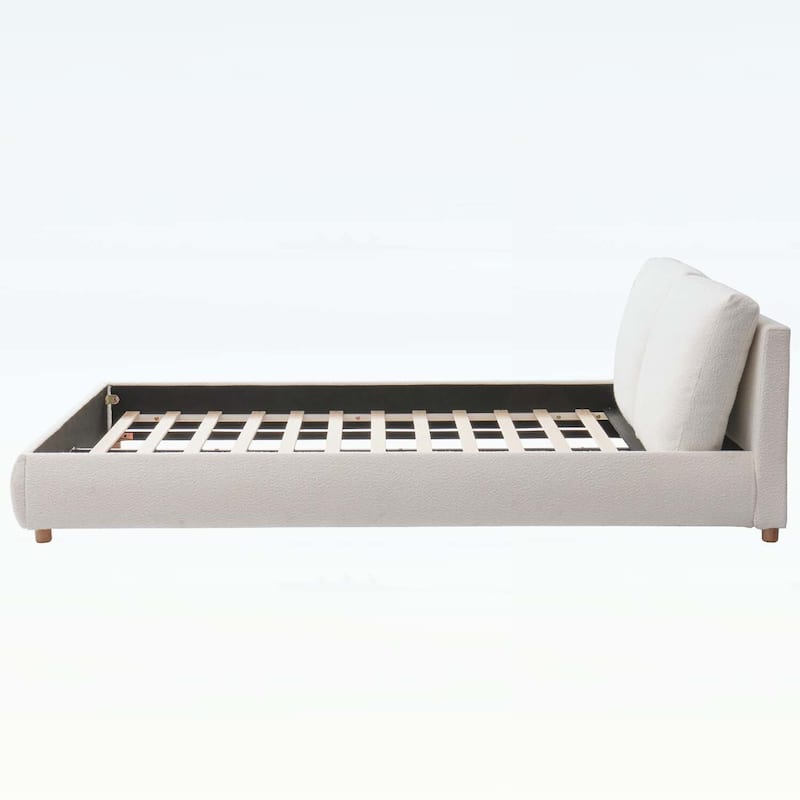 Luxurious Upholstered Platform Bed with Versatile Pillows and Graceful Headboard