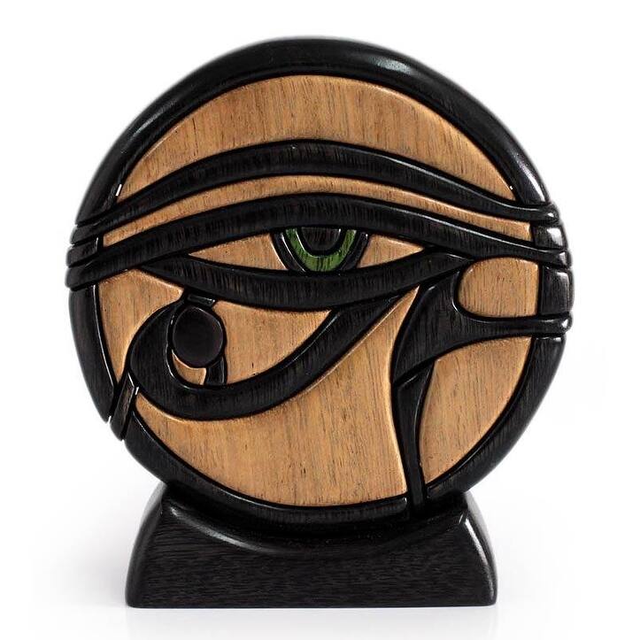 Ishpingo Wood 'Eye of Horus' Sculpture