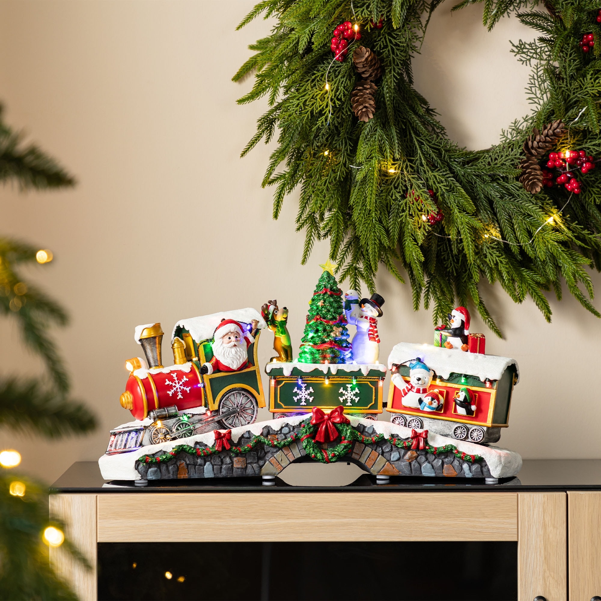 Glitzhome 20"L Lighted Christmas Santa Train Musical Resin Village with Movement and Timer