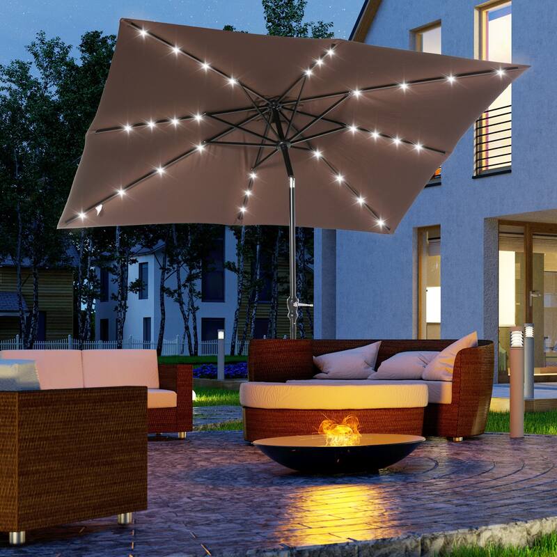Outdoor terrace umbrella with tilting mechanism and LED lighting