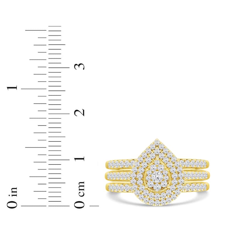 5/8Ct TDW Diamond Pear Shaped Cluster Halo Bridal Set in 10K Yellow Gold for Women