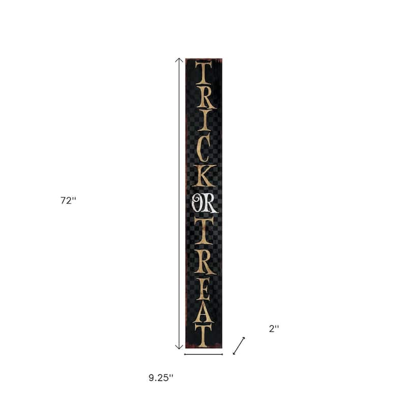 HomeRoots 72" Black And Gold Solid Wood Trick or Treat Halloween Porch Sign