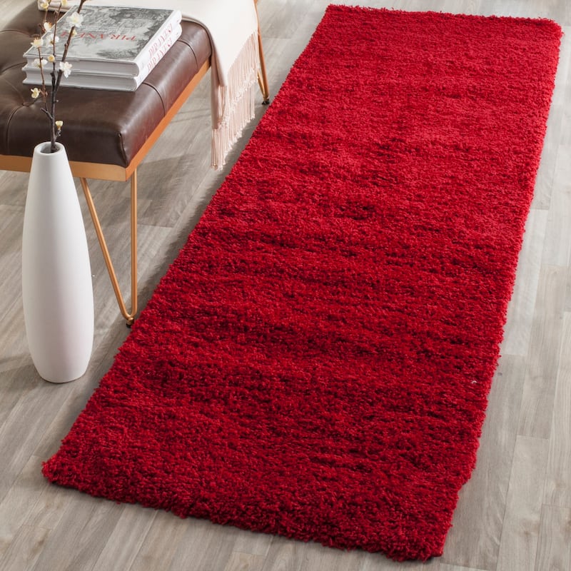 SAFAVIEH Laguna Shag Verdiana Solid Color 2-inch Thick Rug.