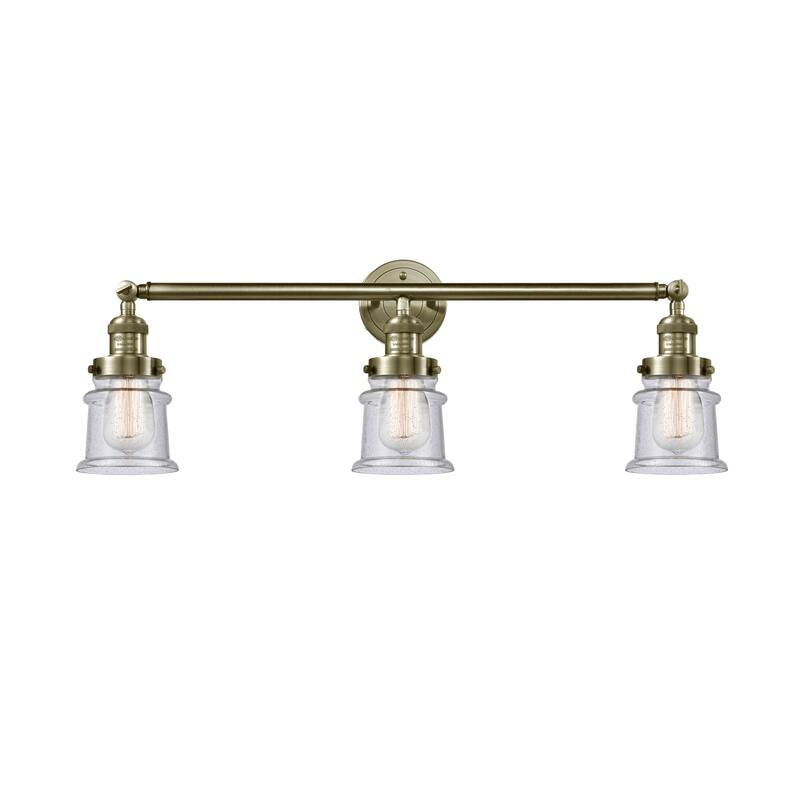 Innovations Lighting Canton - 3 Light 30" Bath Vanity Light - Antique Brass/Seedy
