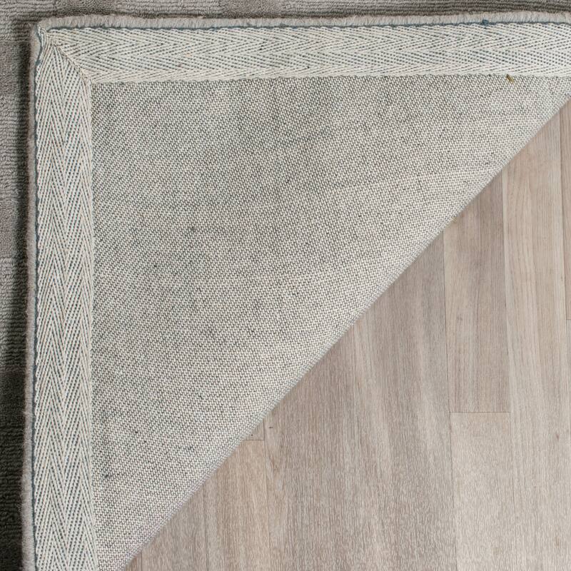 SAFAVIEH Handmade Impressions Rinnie Modern Wool Rug