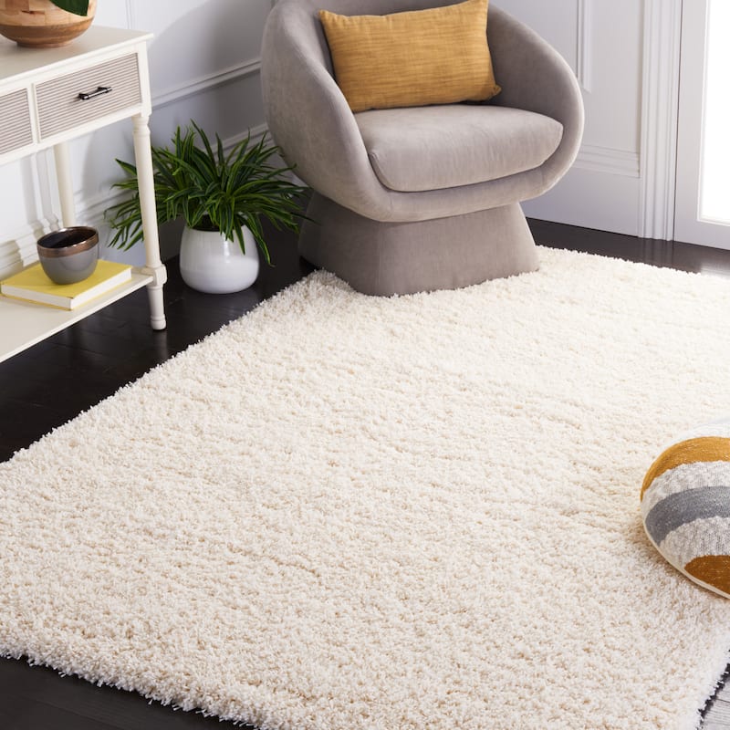 SAFAVIEH Santa Monica Shag Einara 2-inch Thick Area Rug - 5'3" x 7'6" - Ivory - Rectangle