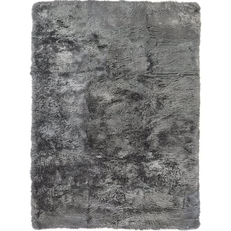 EXQUISITE RUGS Sheepskin Hand-stitched Dark Grey Area Rug.
