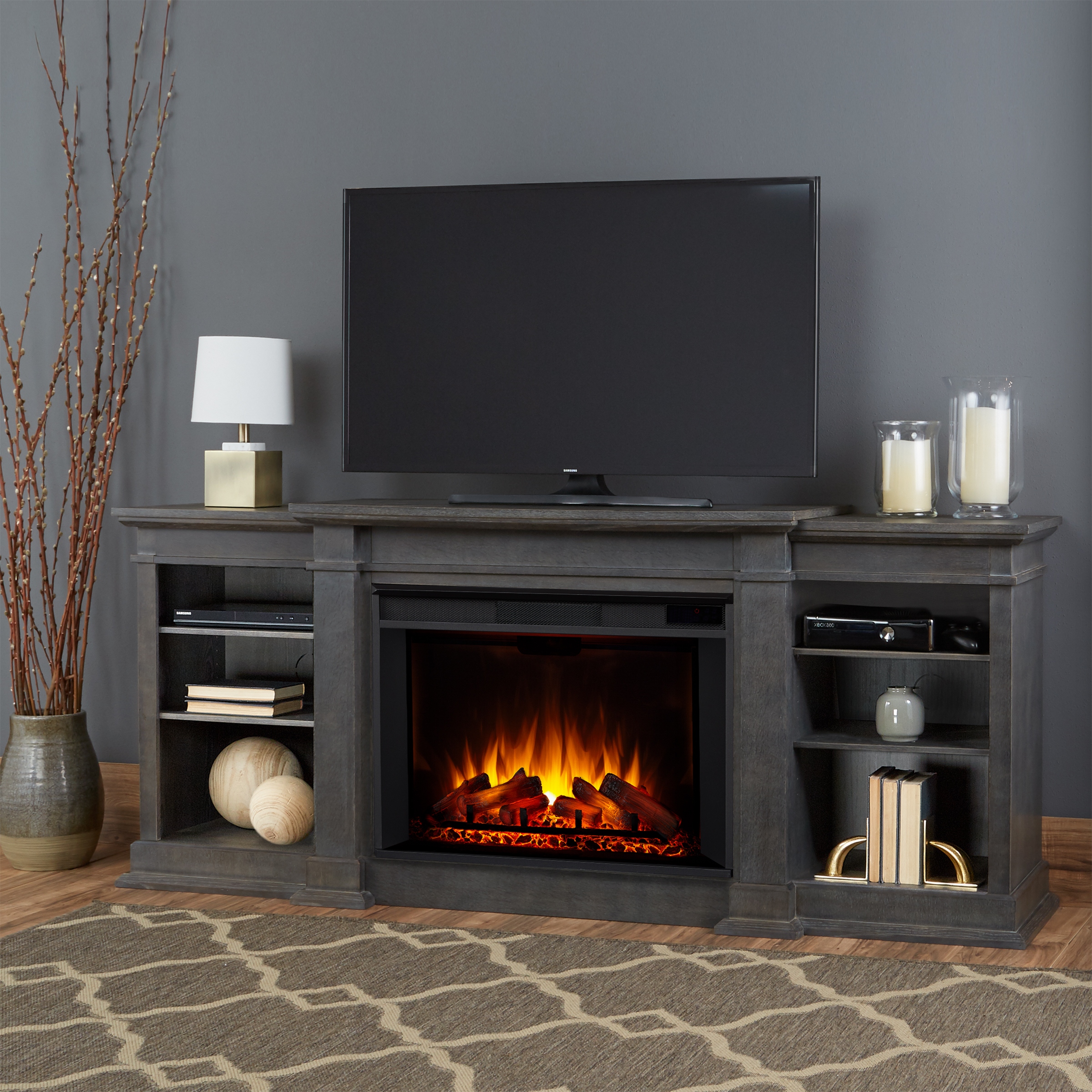 Grey tv top console with fireplace