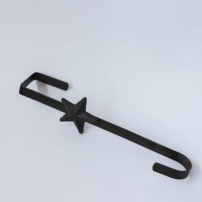 Cast Iron With A Star Wreath Or Stocking Holder