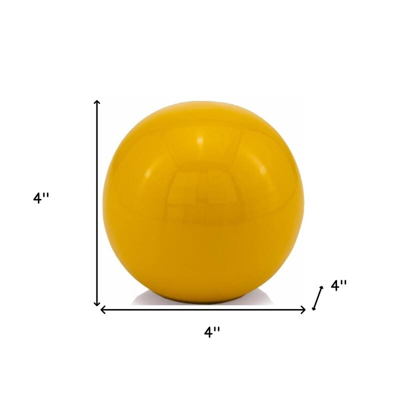 HomeRoots 4" Yellow Metal Decorative Orb - 4' X '4' X '4