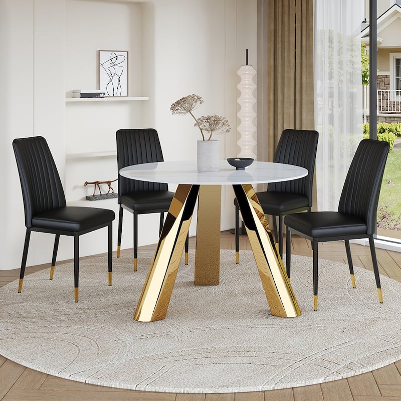 A 42-Inch Round Dining Table With Cast Iron Base And Stainless Steel Legs, Paired With Four White-Gray Striped Dining Chairs