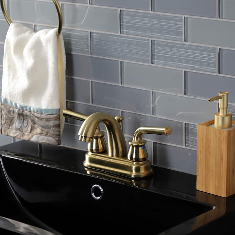 Kingston Brass Restoration Two-Handle 3-Hole Deck Mount 4" Centerset Bathroom Faucet with Plastic Pop-Up