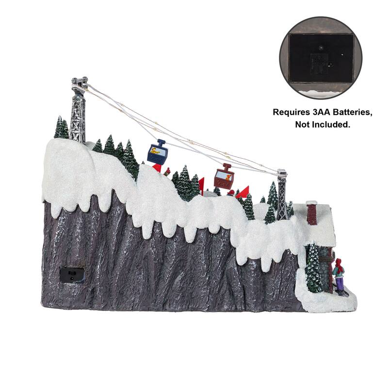 Glitzhome 16"H Christmas Oversized Resin Lighted Musical Skiing Table Village Decor