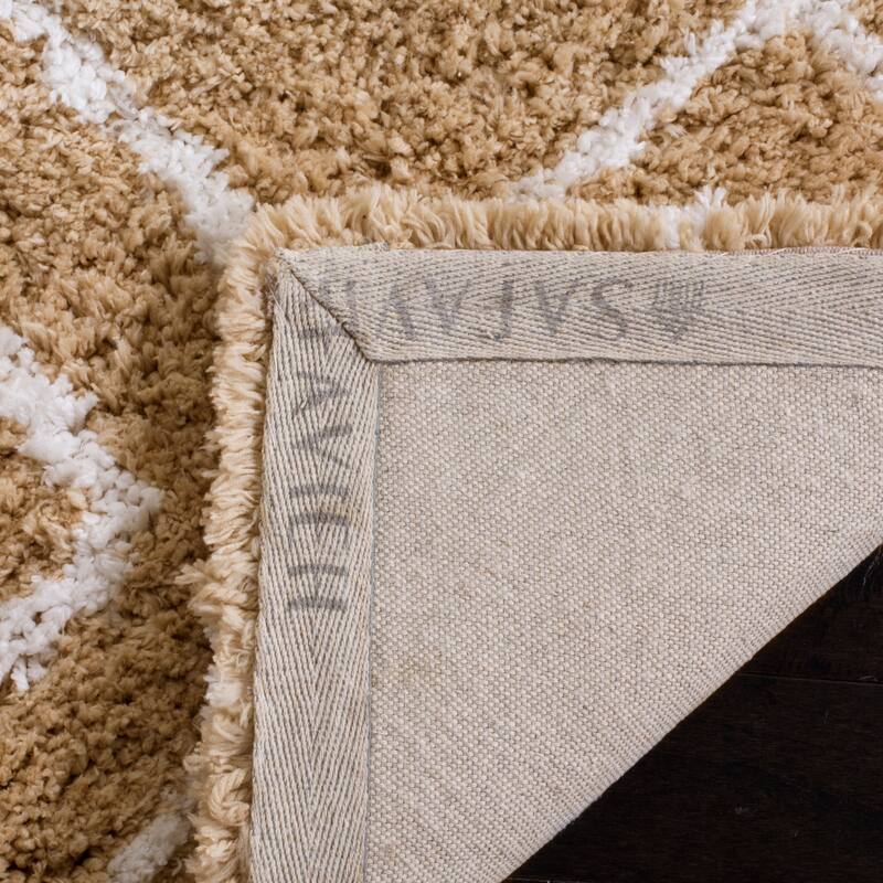 SAFAVIEH Handmade Toronto Shag Welmoet Polyester Rug
