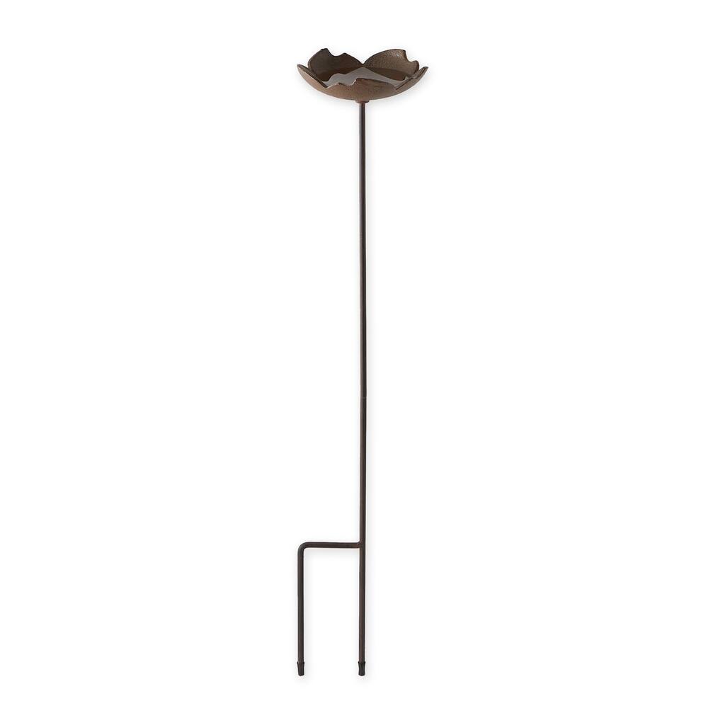 Bird Nesting On Shovel Birdbath